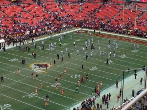 4 cowboys on the playing field